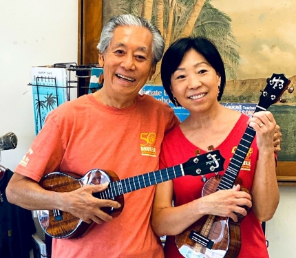 Roy and Kathy Sakuma holding their new Kamaka Ukuleles
